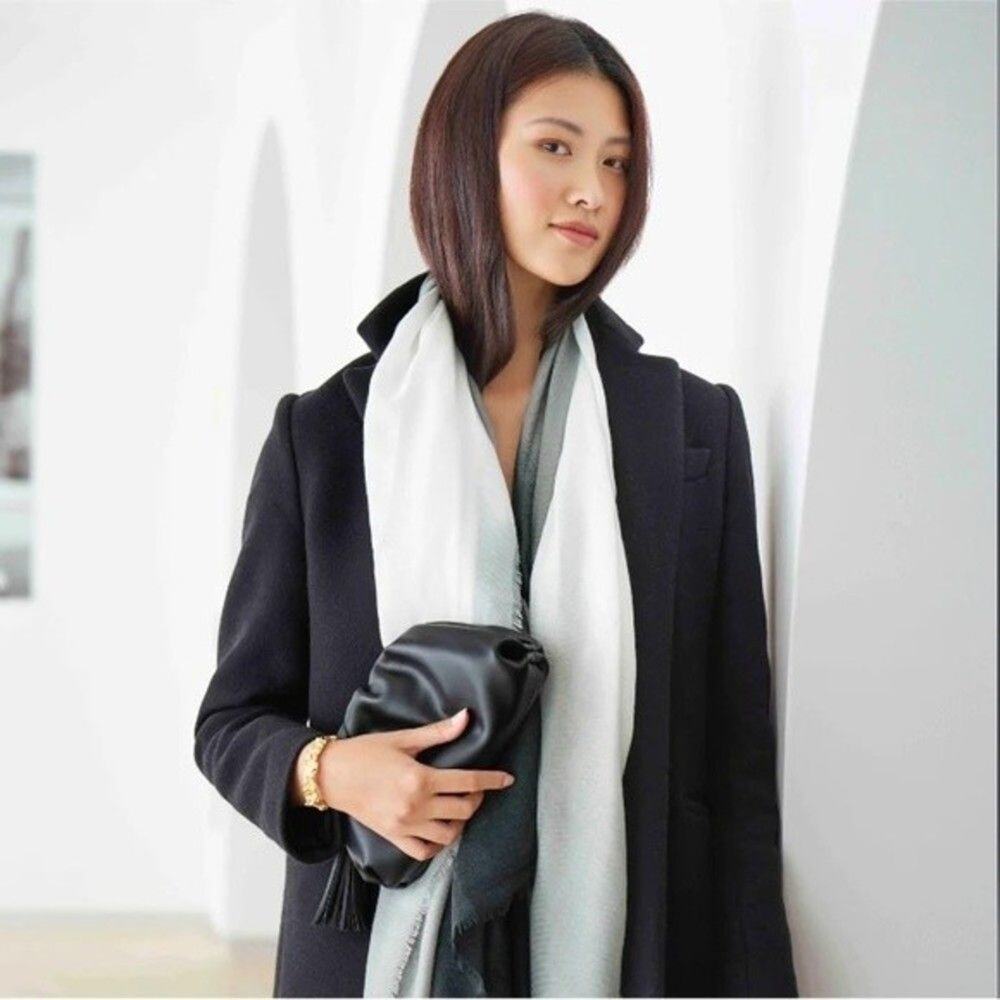 Understated Leather Crescent clutch from Curateur by Rachel‎ Zoe